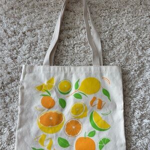 Cream and Orange Tote Bag with Vibrant Fruit Design